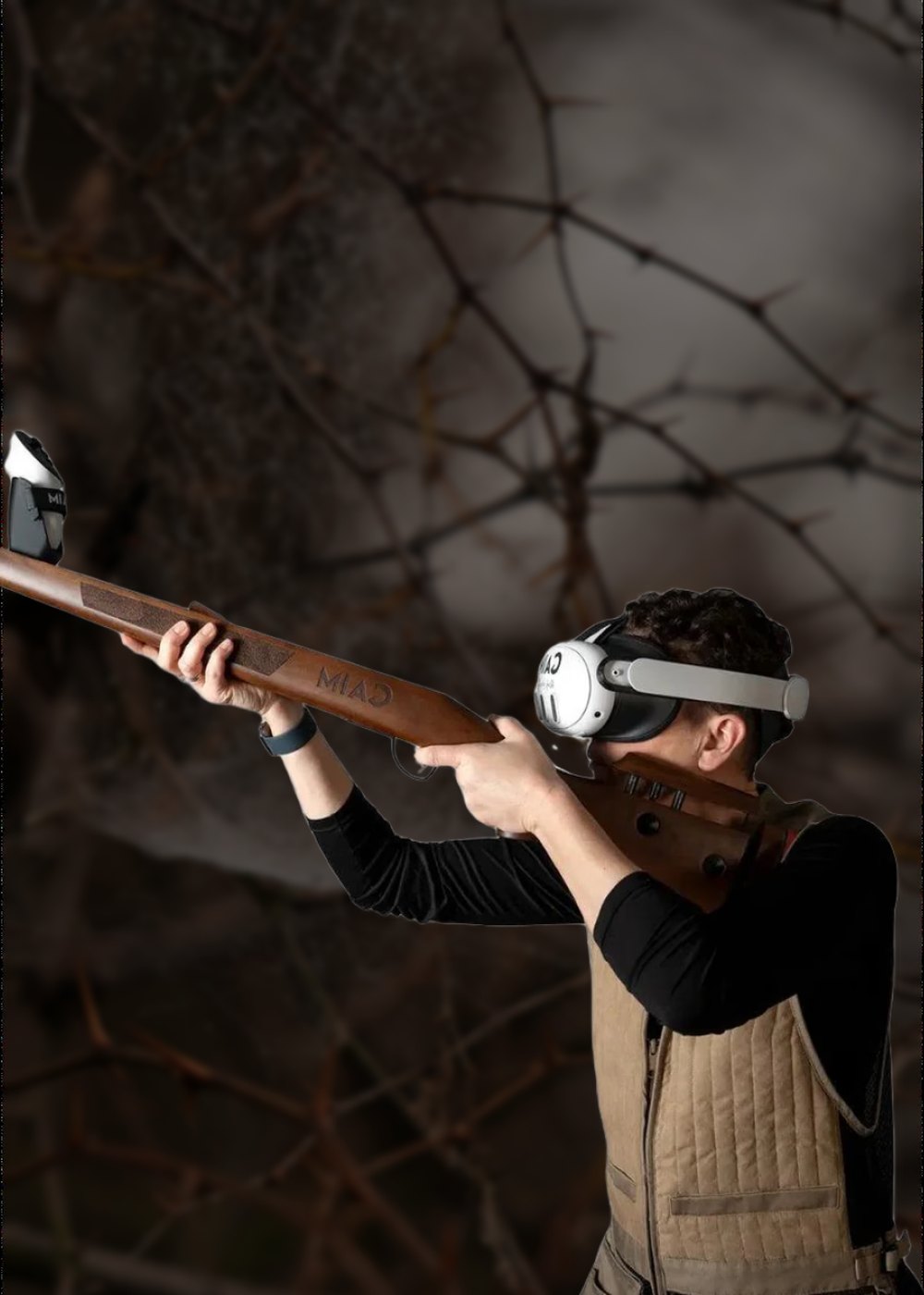 Cazador apuntando con el rifle de madera GAIM y unas Meta Quest